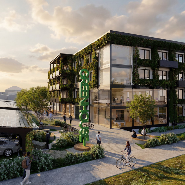 Modernes Coworking-GebÃ¤ude in Ulm mit begrÃ¼nter Fassade, Balkonen und groÃen Fenstern; vor dem GebÃ¤ude fahren einige Personen Fahrrad oder laufen auf einem Platz.